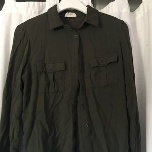 Green button down shirt